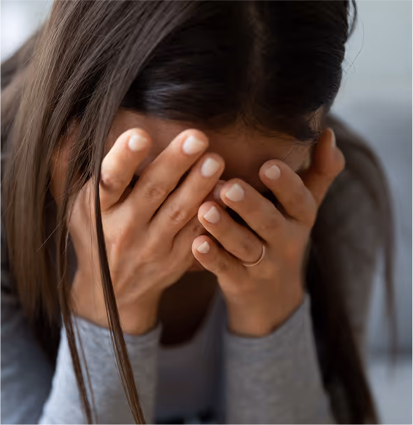 Woman grieving after wrongful death loss.